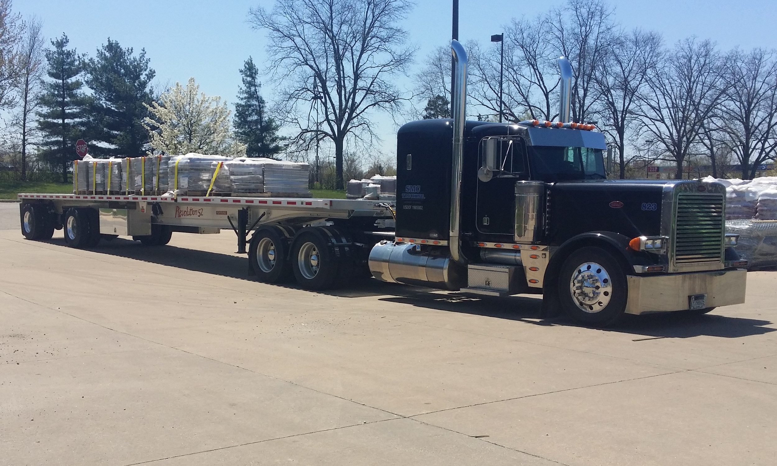 Black Peterbilt Fontaine Flatbed with Concrete Block